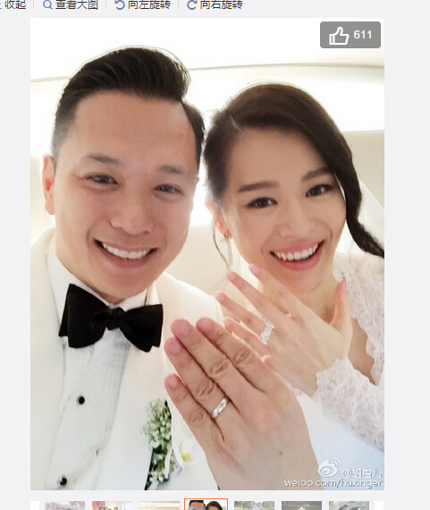 胡杏儿晒大婚现场照 与老公热吻秀对戒(组图)