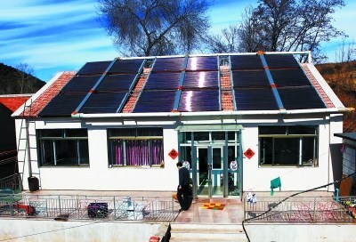 河北农民自建太阳能暖房:不烧煤柴室温18℃以