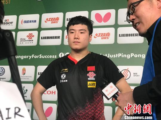 资料图:梁靖昆赛后接受采访 马元豪 摄